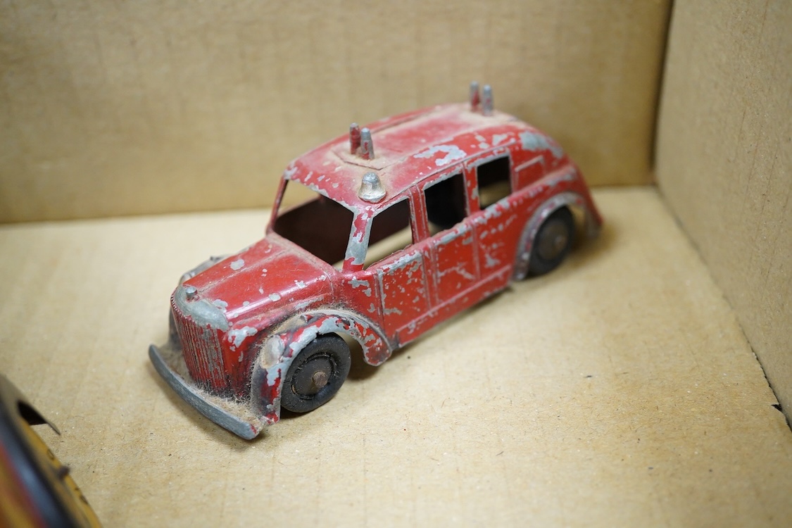 Five tinplate and diecast toys; a Wells Brimtoy tinplate London transport trolley bus, a tinplate RAF fighter aircraft possibly by Mettoy, two TTi (TT Industries) diecast Allard saloon cars, and an Arber Products diecast